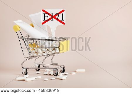 Titanium Dioxide, E171, Dangerous Additive Concept. Gum, Pills, Toothpaste, Cream In Basket And Sign