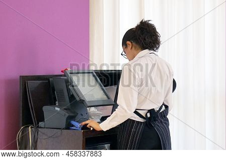 A Restaurant Worker Registrating New Order By Cash-register To The Client Of The Hotel Restaurant. T