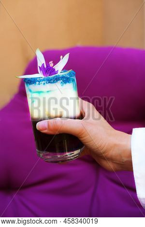 Lavander Fizz, Cocktail Based On Refreshing Gin With Saffron Foam Of Lavender Color. Drinking Glass 