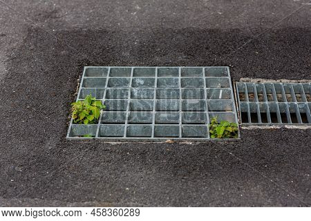 Grille Drain Of Sewer Around The Street Or Walkway . Water Recirculation System. Wastewater Treatmen