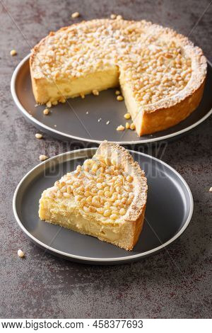 Custard Cream Cake With Pine Nuts Torta Della Nonna Or Grandmother's Cake Closeup In The Plate On Th