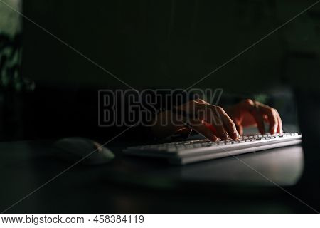 Close-up Hands Of Unrecognizable Hacker Breaking Online Web Site, Engaging Hacking Into Security Sys