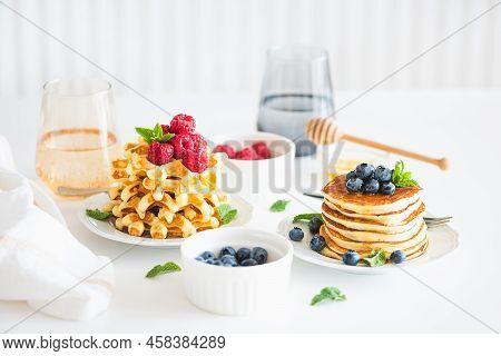 Summer Breakfast. Homemade Baked Ricotta Pancakes And Belgian Waffles With Fresh Berries On White Wo
