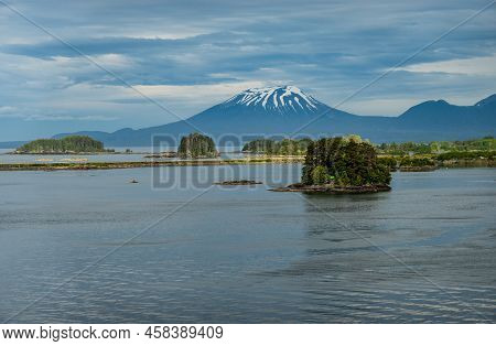 Old Volcano Of Mt Edgecumbe Rises Above The Islands Surrounding Sitka In Alaska