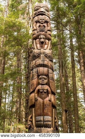 Sitka, Ak - 8 June 2022: Totem Poles Displayed In The Sitka National Historical Park In Alaska