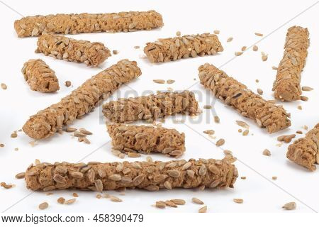 Integral Sticks Made With Whole Wheat Flour And Sunflower Seeds Isolated On Bright Background. Close