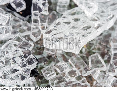 Macro Photo Of The Tempered Glass Broken Into Cubes Lying On The Ground