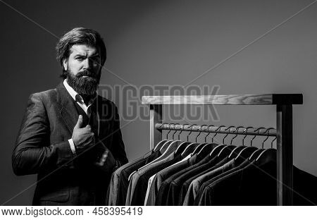 Men Clothing, Boutiques. Tailor, Tailoring. Stylish Mens Suit. Man Suit, Tailor In His Workshop. Han