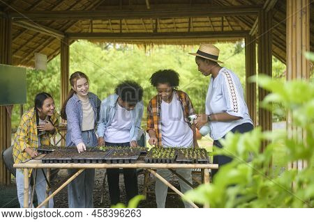 Group Of Mixed Race Students And Teacher Learning Agriculture  Technology In Smart Farming , Educati