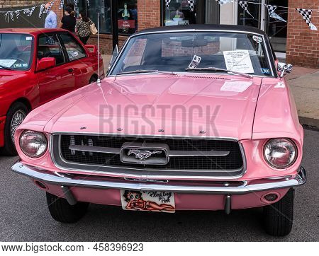 Pittsburgh, Pennsylvania, Usa July 18, 2022 A 1967 Pink Ford Mustang At The Shadyside Car Show Assoc