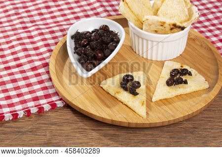 Ants Culonas Typical Gastronomy Of Santander Colombia; Photo On Wood Background