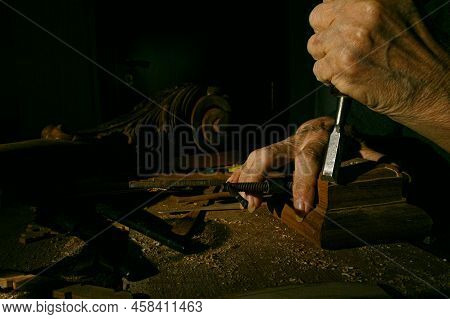 Craftsmans Hands Working On Wood Carving, With Gouge And Chisel Cabinetmaker, Carpentry