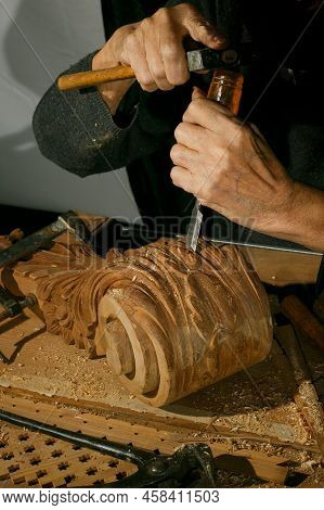 Craftsmans Hands Working On Wood Carving, With Gouge And Chisel Cabinetmaker, Carpentry
