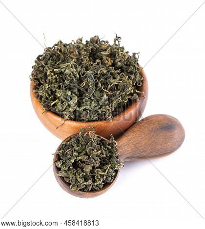 Dry Gynostemma Pentaphyllum Leaf In Wooden Bowl And Spoon, Isolated On White Blackground. Jiaogulan 