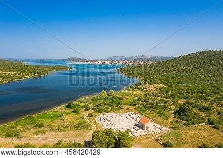 Ivinj Archeological Site With Saint Martin Church And Town Of Pirovac In Background, Croatia