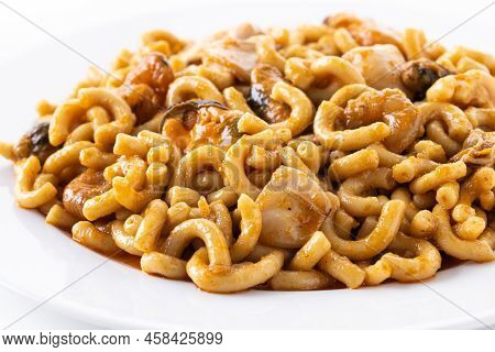 Traditional Spanish Fideua. Noodle Paella Isolated On White Background. Close Up