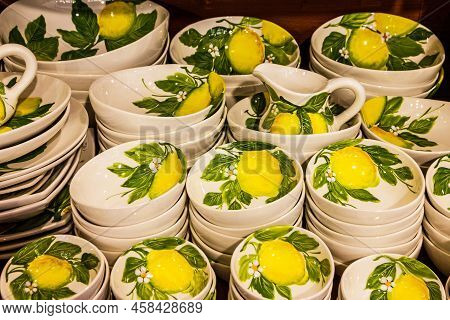 Traditional Ware In Lombardy, Italy. Lemon Dedcorated Bowls And Plates.