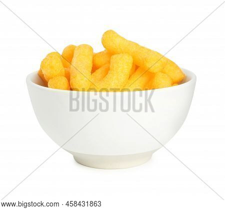 Many Tasty Cheesy Corn Puffs In Bowl Isolated On White