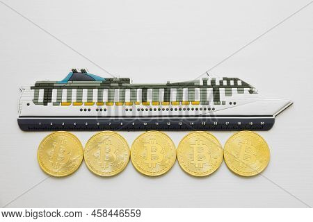 Cruise Liner On Bitcoin Golden Coins - Cryptocurrency Financial Conceptual Image.