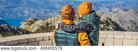 Banner, Long Format Dad And Son Travellers In Mountain Landscape At National Park Lovcen, Montenegro