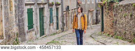 Banner, Long Format Man Tourist On Background Of Scenic Panorama View Of The Historic Town Of Risan 