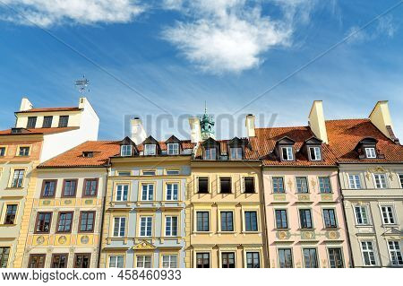 Colourful Buildings Of Warsaw's Old Town Market Square, Which Was Completely Destroyed During The Wo
