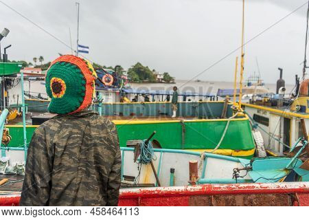 Black Fisherman In The Caribbean Of Nicaragua Looking Out To Sea