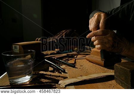 Craftsmans Hands Working On Wood Carving, With Gouge And Chisel Cabinetmaker, Carpentry