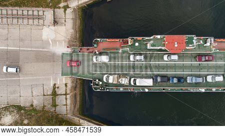 Top Down View Of Ferryboat. Ferryboat Transferring Cars. Ferry Transfers Cars And Passengers To The 