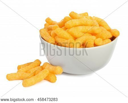 Many Tasty Cheesy Corn Puffs In Bowl Isolated On White