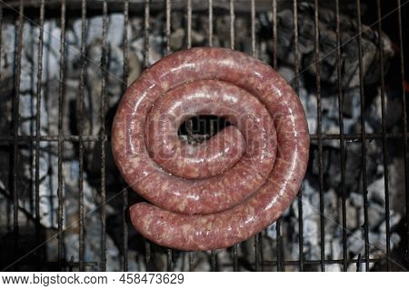 Home-made Butifarra Sausage Grilled On The Fire, In A Private House