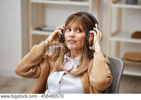 Joyful Young Blonde Student Lady In Warm Sweater Wear Headphones Ready To Listen Fav Songs Looks Asi