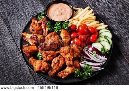 Spicy Roast Chicken Wings With French Fries, Tomatoes, Cucumber, Red Onion And Thousand Islands Dip 