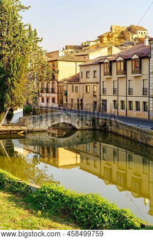 Douro River As It Passes Through The Pretty Medieval Village Of San Esteban De Gormaz In Soria, Spai