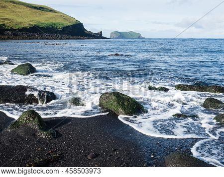 Waves Rolling Over Black Volcanic Sand On Klauf Beach, Heimaey Island - Westman Islands, Iceland