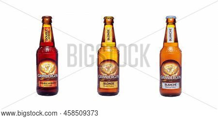 Poltava, Ukraine - July 21, 2022: Bottles Of Grimbergen Beer Isolated On A White Background. Double 