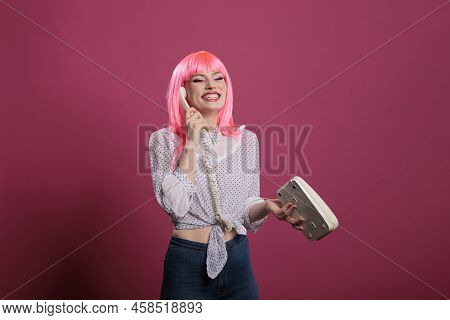 Beautiful Woman With Pink Hair Talking On Landline Phone Call, Chatting On Retro Telephone Cord Line