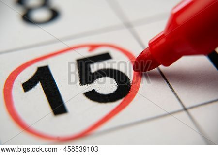 The Calendar 15th Day Of The Month Is Circled. A Red Marker Circles The Fifteenth Day Of The Month F