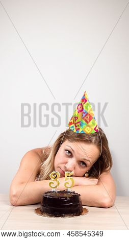 A Woman Celebrates Her Birthday Alone. Beautiful Sad Woman Clebrating Her Birthday Alone