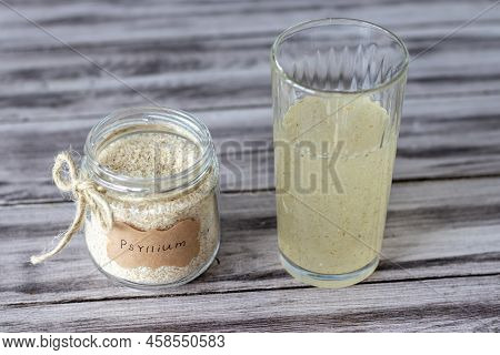 Psyllium Is The Husk Of A Plantain. Psyllium In A Jar And Diluted With Water In A Glass.
