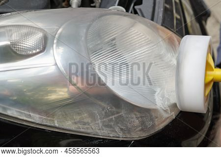Big Headlight Cleaning With Power Buffer Machine At Service Station, Before Cleaning