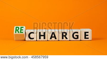 Charge Or Recharge Symbol. Turned Wooden Cubes And Changed The Word Charge To Recharge. Beautiful Or