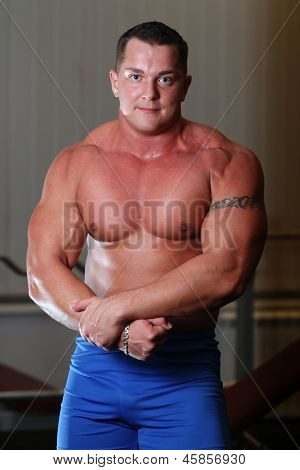 Pumped Young Man With Tattoo