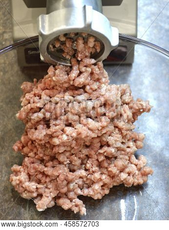 Minced Meat From An Electric Meat Grinder In The Home Kitchen. Grinding Meat Into Minced Meat For Th