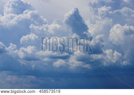 Blue Sky With Lowering Clouds. Abstract Darksome Background