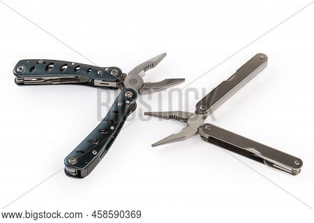 Two Different Multi-tools With Metal Handles And Open Pliers On A White Background