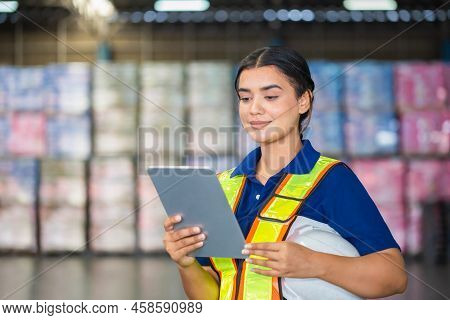 Cheerful Warehouse Worker With Digital Tablet Checking Inventory In Warehouse, Female Warehouse Work