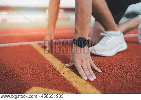 Hands Runner Ready Start To Run Athlete Sportman Training Run On Lane At The Stadium In Morning. Run