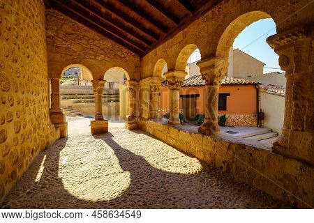 Romanesque Cloister With Stone Arches In The Church Of San Miguel In The Village Of San Esteban De G
