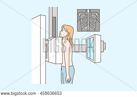 Naked Woman Making Breast X-ray Shot In Hospital. Female Patient Scanning Lungs On Radiograph Machin